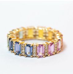 This exquisite 18K gold ring is a true testament to luxury and elegance. The ring features real natural multicolor sapphires and real natural diamonds, meticulously set to enhance its beauty and sparkle. Perfect for any occasion, this ring combines timeless design with the finest materials, making it a cherished addition to any jewelry collection. - **Material 18K Gold (4.5 grams) - **Gemstones Real Multicolor Sapphires and Diamonds - **Price $1500 (shipping included) Indulge in the sophistication and charm of this remarkable gold ring, crafted to perfection for those who appreciate the finer things in life. 18k Gold Ring, Real Stone, Unique Gemstones, Multi Stone Ring, Multi Stone, Sapphire Diamond, Elegant Jewelry, Gemstone Ring, Stone Rings