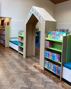 children's bookshelves and benches in a library