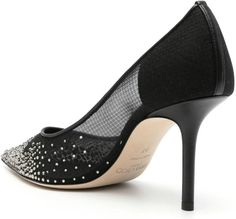 Step up your shoe game with these stunning crystal embellished pumps. The jet black mesh paneling and pointed toe add a touch of sophistication, while the slip-on style and branded footbed ensure comfort and ease. With a 85mm stiletto heel and leather sole, these pumps are the perfect combination of style and functionality. JET BLACK MESH PANELING CRYSTAL EMBELLISHMENT POINTED TOE SLIP-ON STYLE BRANDED FOOTBED LEATHER SOLE 85MM STILETTO HEEL Crystal Pumps, Crystal Embellishment, Mesh Panel, Black Pumps, Shoe Game, Black Mesh, Jet Black, Stiletto Heel, Step Up