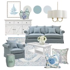 a living room with blue and white decor on the walls, couches, coffee table, lamps, rugs and other items