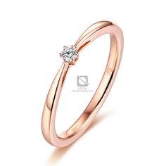 a rose gold ring with a single diamond