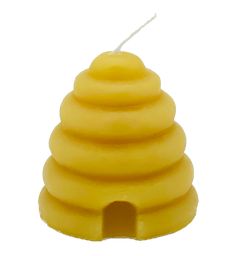 a small yellow candle with a white string hanging from it's end and a beehive on top