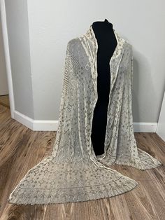 This stunning Egyptian Vintage Assuit shawl is from between the 1920 's to 1930's. It is a cream colored shawl that is in perfect condition. This shawl is 25 inches wide by 85 inches long. Please reach out with any questions, I am open to offers! Elegant Cream Shawl Dupatta, Cream One-size Shawl Scarves, Cream Shawl Scarf One Size, Fitted Vintage Shawl, Fitted Vintage Shawl For Wedding, Vintage Fitted Shawl For Wedding, Vintage White Shawl Scarf, Beige Shawl Dupatta, Beige Dupatta Scarf Shawl