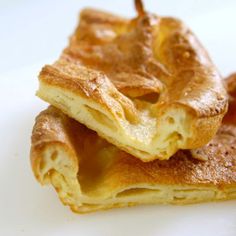 two pieces of pastry sitting on top of each other