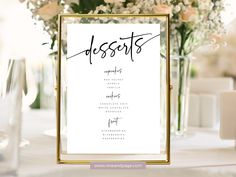 an elegant table setting with flowers in vases and desserts menu card on it