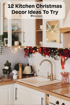 a kitchen decorated for christmas with red and green decorations on the counter top, white cabinets and wooden counters