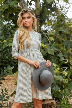 DETAILS: A ribbed striped midi dress featuring a pleated skirt, cinched elastic waistline, 3/4 sleeves, side pockets and a rounded neckline. This style was created to be worn before, during, and after pregnancy. Casual Ribbed Maternity Dresses, Ribbed Maternity Dress For Spring, Fall Striped Ribbed Dresses, Fall Striped Knee-length Midi Dress, Spring Striped Ribbed Dresses, Spring Ribbed Maternity Dress, Maternity Midi Dress, Striped Midi Dress, After Pregnancy