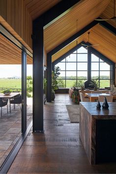 the inside of a house with large windows