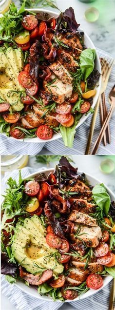 two plates filled with chicken, tomato and avocado salad