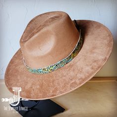 If you’re looking for the perfect accessory to complement your favorite boho style, look no further. The Boho-Style Western Felt Hat w/ Embossed Leather Hat Band by The Jewelry Junkie is absolutely everything that you need. Not only is it easy to incorporate into any and all outfits, but the genuine leather of the band immediately elevates whatever it is you’re wearing. Match your one-of-a-kind hat with any one of the matching accessories that we have for a completely gorgeous look. One Size Hat Brown Adjustable Hat For Festivals, Adjustable Brown Hat For Festivals, Adjustable Brown Hat For Festival, Adjustable Brown Bohemian Hat Bands, Bohemian Brown Fedora With Curved Brim, Bohemian Brown Hat Bands For Country Events, Bohemian Fedora With Short Brim For Western-themed Events, Southwestern Brown Hat Bands For Vacation, Southwestern Style Brown Hat Bands For Vacation