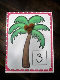 a printable coconut tree counting mat with the number 3 on it and an orange pom pom