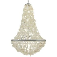 a white chandelier hanging from the ceiling with lots of beads on it's sides