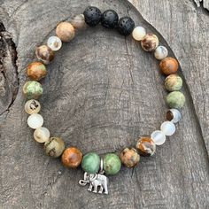 Stay Grounded While Abundance Flows To You! Brown For Grounding And Green For Abundance, Colors Of Earth And Nature. Moss Opal And Montana Agate. Elephant Charm Enhances Intention Representing Abundance...Luck. Lava Beads Act As Diffusers For Essential Oil Aromatherapy. Stretch Bracelets Approx 7.5”. Clear Bracelet, Magnetic Beads, Aromatherapy Bracelet, White Pearl Bracelet, Sparkle Bracelet, Lucky Elephant, Stay Grounded, Elephant Bracelet, Montana Agate