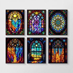 four stained glass windows with different colors and designs on the wall in front of them