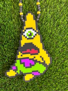 this SUBTRONICS perler Is a must have perler necklace. Handmade to order Perfect to collect or trade. made strong and durable for the headbangers 🤞🏽. Can customize colors, ships out fast. Spongebob Perler, Electric Forest Perler, Perlers Edm, Edm Dj Perlers, Subtronics Perler Beads, Edm Perler, Subtronics Perler Pattern, Subtronics Perler, Rave Perler