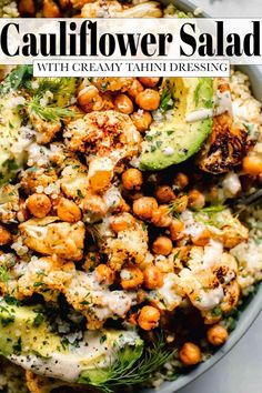 a bowl filled with cauliflower, chickpeas and avocado