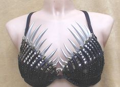 This Custom bra is guaranteed to get attention. Made of various embellishments and textures to make anyone who wears it feel like a bad ass. Free shipping within the USA. Please contact me for shipping outside the USA. Fashion Boutique Interior, Decorated Bras, Festival Fashion Outfit, Diy Bra, Burlesque Costumes, Wedding Sneakers, Fashion Background, Rave Bra, Head Dress