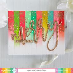 a christmas card made with the merry word dieing from stampin's paper studio