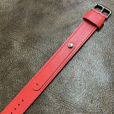 Product Description:  Ladies Vintage Watch Leather Wrist Strap Band Strap Material: Genuine Cow Leather (front & back) Hardware: Silver Tone Stainless Steel Buckle Watchband Dimensions: Total strap length: 250mm (fit wrist size 155 to 210mm) Size (watch lug): 8/9/10/11/12/13/14mm Strap Width: 24mm  Buckle Width: 24mm Thickness: 3mm Red Watch With Adjustable Leather Strap, Red Leather Strap For Watches, Red Adjustable Leather Strap For Watches, Adjustable Red Leather Watch Bands, Red Rectangular Watch Band With Bracelet Strap, Red Adjustable Rectangular Watch Bands, Red Leather Bracelet Strap Watch Bands, Adjustable Red Rectangular Watch Bands, Classic Red Watch Bracelet Strap