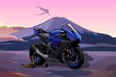 a blue motorcycle is parked in front of a mountain with a bird flying over it