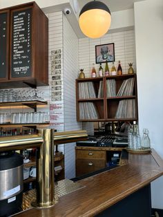 the interior of a small bar with lots of shelves