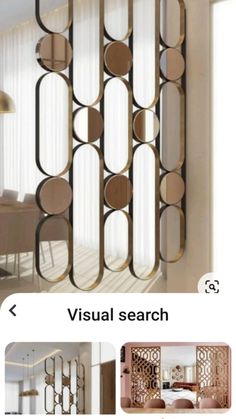 an image of a room divider made out of mirrors and metal circles on the wall