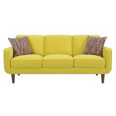 a yellow couch with two pillows on the arm and one pillow on the other side