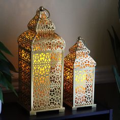 PRICES MAY VARY. STYLE: Moroccan candle lanterns are exquisite, decorative lighting accents that have been popular in Moroccan and Middle Eastern decor for centuries. They are known for their intricate designs and their ability to cast enchanting patterns of light and shadow when illuminated. Moroccan decorative lanterns create captivating light patterns through the openings in their metalwork. The intricate patterns allow light to filter through, casting beautiful and mesmerizing patterns on wa Middle Eastern Decor, Moroccan Candles, Lantern Hooks, Moroccan Lantern, Indoor Home Decor, Moroccan Theme, Style Marocain, Hampton House, Large Lanterns