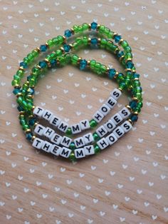 Best Friends bracelets are always cute, but what if your friend group contains three people? This trio of matching bracelets offers a perfect but hilariously snarky solution. This trio of handmade beaded bracelets feature metallic gold spacer beads with dark green iridescent seed beads and 4mm bright blue faceted bicone beads with white and black small square alphabet letter beads. Bracelets are approximately 7 inches and is made with clear stretchy elastic and should small and medium wrists. If you need a smaller or larger size, message me and I'll see what I can do! Please be careful with the bracelet as it is not indestructible. Avoid water, gels, lotions, soaps, etc. Not intended for children. Please note that beads are a choking hazard and I am not liable if they are ingested. Cancell Novelty Green Beaded Bracelets For Friendship, Matching Bracelets For Best Friends, Bracelets Best Friends, Best Friends Bracelets, Friendship Best Friends, Friends Bracelets, Bracelets Kandi, Matching Friendship Bracelets, Diy Kandi Bracelets