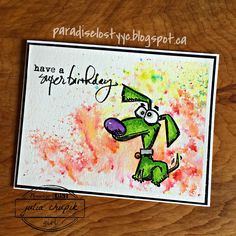 a handmade birthday card with a cartoon dog holding a purple ball in it's mouth