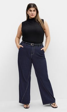 Both curve-loving and trendy, the Harley Kyla Wide Leg Jean is just begging to be worn. Made with stretch cotton blend fabrication and high denim fibre, you're sure to reach for this piece for years to come. Compete with a high rise style, fit and flatter your curves endlessly with these jeans. Key Features Include: - The perfect fit for an hourglass figure - Belt looped semi elasticated waistband - High rise - Side pockets - Single button and fly fastening - Inside leg seam detailing - High den Mid Size Jeans, Plus Size Jean, High Rise Style, Denim Chic, Dark Denim Jeans, Plus Size Jeans, Clothing Styles, City Chic, Denim Outfit