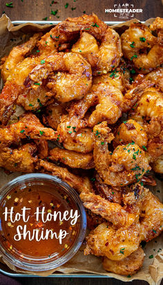 hot honey shrimp with dipping sauce in a bowl on the side and text overlay that reads hot honey shrimp