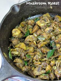 mushroom roast in a skillet with green leaves on the side, ready to be eaten