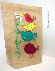 a canvas bag with two birds on it