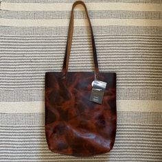 This Was Beautifully Made By A Dear Friend Of Mine. She Does Amazing Leather Work And Made This Beauty Which Is One Of A Kind! Pocket Inside, Stained Brown Leather On The Outside. The Perfect Leather Handbag! Brown Textured Leather Bag For Daily Use, Textured Leather Pouch Bag For Everyday Use, Textured Leather Everyday Pouch Bag, Textured Leather Pouch For Everyday Use, Everyday Rectangular Shoulder Bag With Leather Backing, Everyday Pouch Bag With Leather Backing, Handmade Leather Purse, Beautifully Made, Leather Work