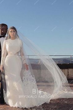 the bride and groom are posing for a photo