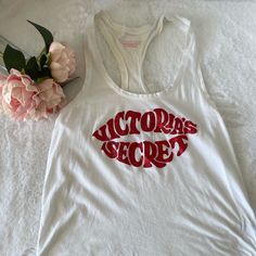 Victoria’s Secret Xs White Red 80s Kiss Lips Sparkly Cropped Round Hem Tank Victoria’s Secret Xs White Graphic Lips Retro Sparkly Glitter Cropped Round Hem Tank Top Valentine’s Day New Without Tags Never Worn Great For Valentine's Day Check Out My Other Listings! I Will Be Posting Daily! Fianc Is Moving In So I’m Running Out Of Space And Could Use Extra Cash! Help A Bride Out! Victoria's Secret Summer Tops With Letter Print, Victoria's Secret Letter Print Summer Tops, Victoria's Secret White Stretch Top, Victoria's Secret Stretch White Top, White Stretch Top By Victoria's Secret, Kiss Lips, Out Of Space, Extra Cash, New Day