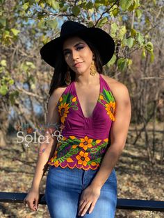 This Beautiful Sunflower Embroidered Halter Top is the perfect Top for Everyday use or a special event. It is comfortable, with elastic on the back and has a tie around the neck for an adjustable fit. This blouse comes in one size which fits sizes Small and Medium. Fitted Floral Embroidered Top For Festival, Fitted Multicolor Embroidered Top For Festival, Fitted Top With Multicolor Floral Embroidery, Fitted Multicolor Floral Embroidered Top, Fitted Floral Embroidered Top For Summer, Fitted Floral Print Embroidered Top For Summer, Fitted Traditional Top With Floral Print, Fitted Traditional Tops With Floral Print, Traditional Fitted Floral Print Tops