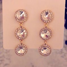 Gorgeous Brand New Crystal Statement Earrings These Are Classic + Timeless, Match With Every Outfit Three Large Rivoli Type Crystals Surrounded By Sparkly Small Rhinestone Crystal Halos Gold Color Setting, Post Backs We Have Matching Earrings, Bracelets And Necklaces And A Large Variety Of Crystal And Statement Jewelry In Our Closet, Check Out Our Other Listings! Tags Birthstone J Crew, Express, Banana Republic, Sorelli, Bridesmaids, Holidays, Christmas, New Year’s, Easter, Birthday, Graduation, Nickel-free Round Crystal Earrings For Party, Nickel-free Crystal Earrings For Party, Pageant Stage, Crystal Statement Earrings, Swarovski Crystal Rings, Easter Birthday, Swarovski Crystal Bracelet, Swarovski Crystal Necklace, Crystal Dangle Earrings