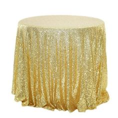 a gold sequin tablecloth on a white background