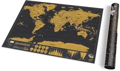 a black and gold world map on a mouse pad next to a pen that is laying beside it