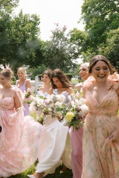 Garden party theme bridesmaid dresses and candid Austin wedding photography moment Whimsical Wedding Bridesmaids Dresses, Garden Party Wedding Photos, Colorful Wedding Photos, Whimsical Wedding Photos, Dreamy Wedding Photography, Formal Garden Party Wedding, Whimsical Bridesmaid Dresses, Whimsical Bridesmaids Dresses, Whimsical Engagement Photos