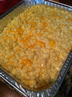 a casserole dish with macaroni and cheese on it in a pan