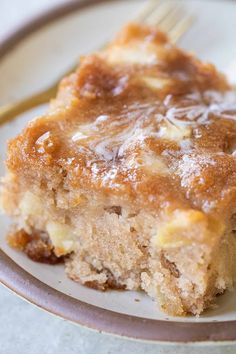 a piece of cake on a plate with a fork