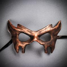 This Beautiful Masquerade Mask Can Be A Display Piece Or Worn Using Ribbon Attached On Each Side Of The Face. Covers Full Face As Devil With Your Costume. The Mask Has A Matte Black Surface That Allow You To Paint Your Own Design On The Mask. Color: Black Copper Kdm-W7353-Bkcp Gothic Masks For Halloween And Masquerade, Spooky Black Mask For Masquerade, Spooky Black Masks For Masquerade, Spooky Black Masks And Prosthetics For Masquerade, Spooky Black Masquerade Mask, Red Masquerade Mask, Masquerade Men, Masquerade Mask Black, Ball Masks