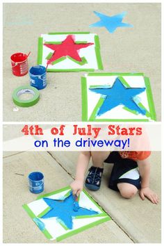 a toddler painting stars on the sidewalk with blue and green paint, while another child is