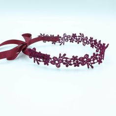 This eye-catching Astrid Burgundy Lace Choker Necklace is the ideal boho choker with satin ribbon to complete your chic look. Your go-to pick for expressing your boho style with a playful ribbon quirk. Ties up with a satin ribbon, giving you freedom over adjustability. Delicate yet durable Lightweight, wear-resistant design Blends it well with other jewelry items Flexible and feels easy on the skin Seamlessly ties up with satin ribbon Non-fraying edges keep the form intact Adjustable Fit LACE CH Adjustable Ribbon Hair Accessories For Parties, Elegant Adjustable Ribbon Headband, Elegant Adjustable Ribbon Choker, Bohemian Adjustable Headband For Gift, Elegant Adjustable Headband For Gift, Adjustable Butterfly Knot Hair Accessory For Gift, Adjustable Hair Accessories With Butterfly Knot For Gifts, Adjustable Burgundy Jewelry For Party, Elegant Ribbon Headband As A Gift