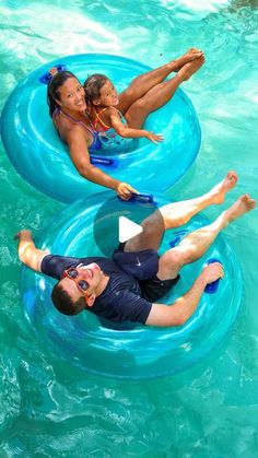 three people are floating on inflatable rafts in the water with their feet up