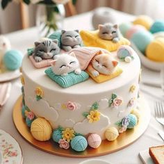 there is a cake decorated with cats on it