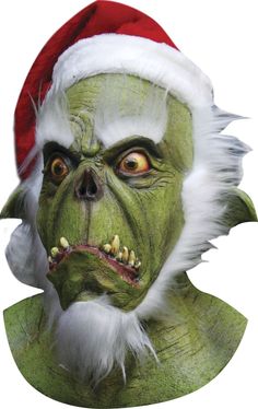 a green man wearing a santa claus hat